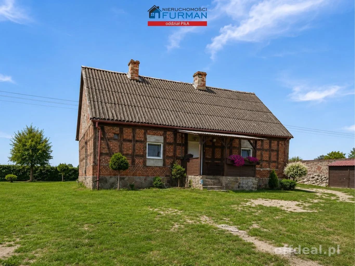 Urokliwy dom z cegły obok jeziora Stryjewo