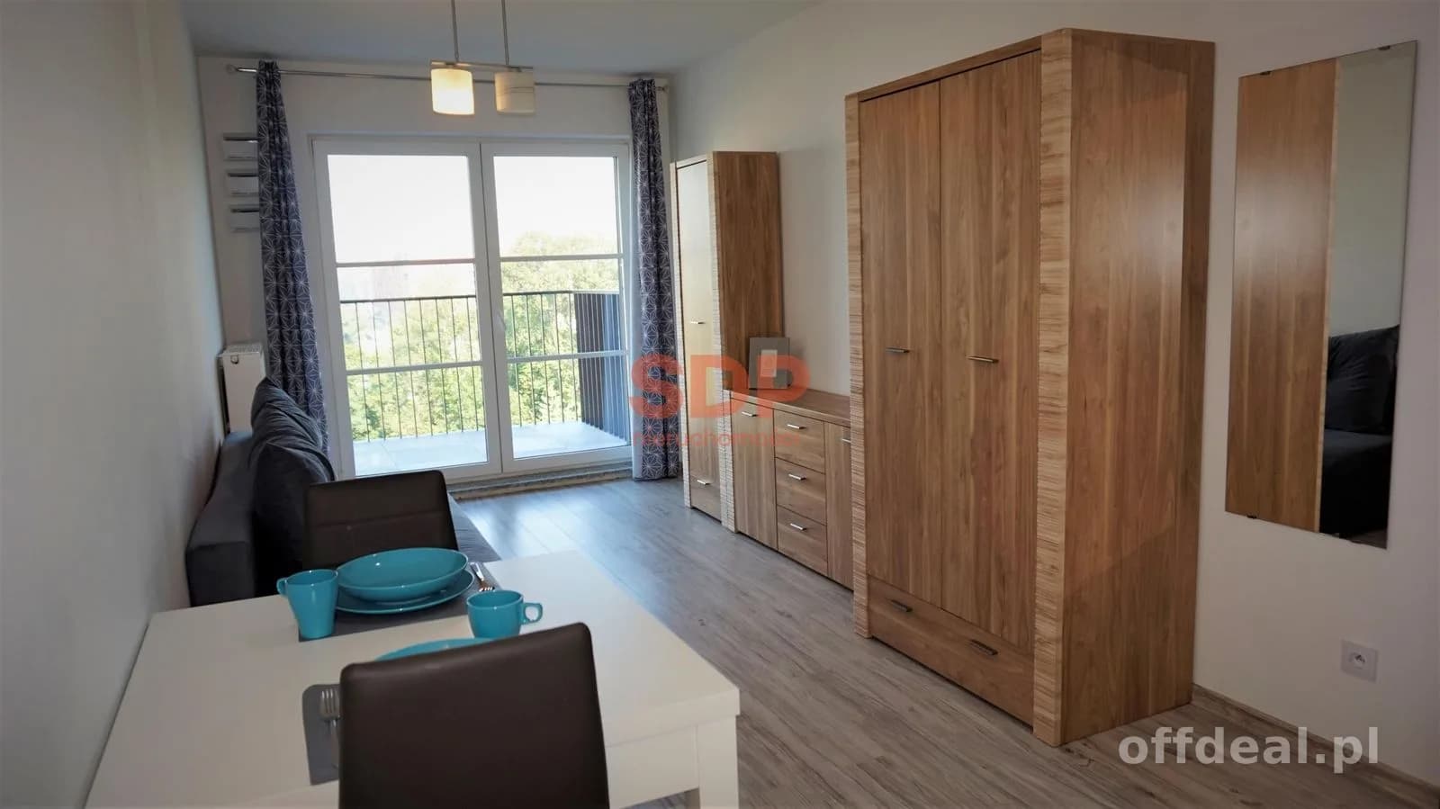 Kawalerka z balkonem. Apartamentowiec