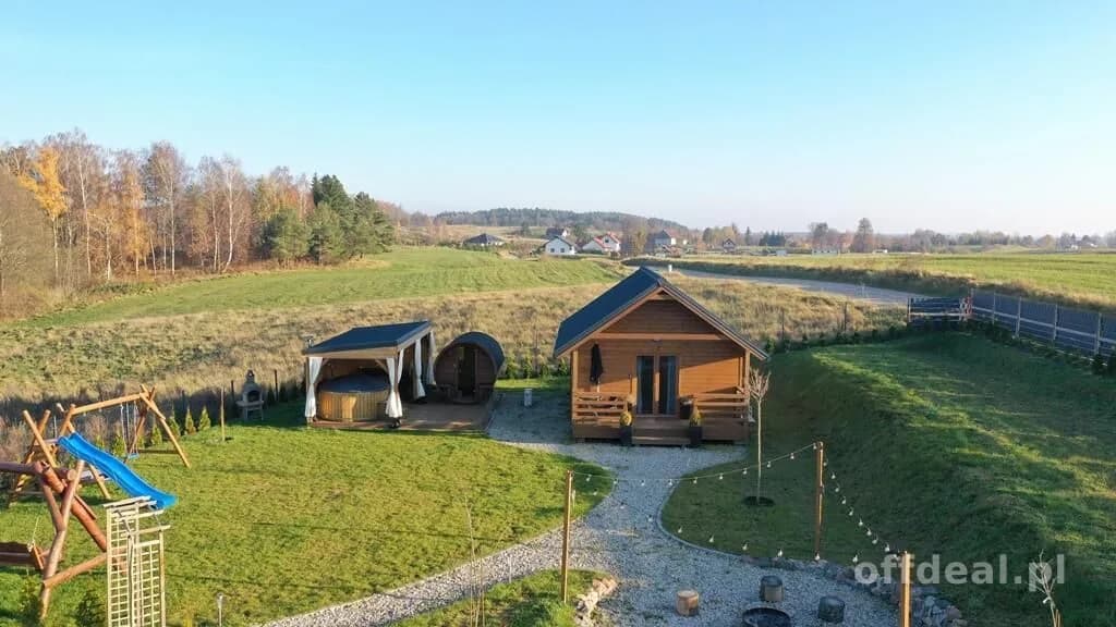 Sprzedam działkę bud. z całorocznym domkiem rekreacyjnym Szczybały Giżyckie