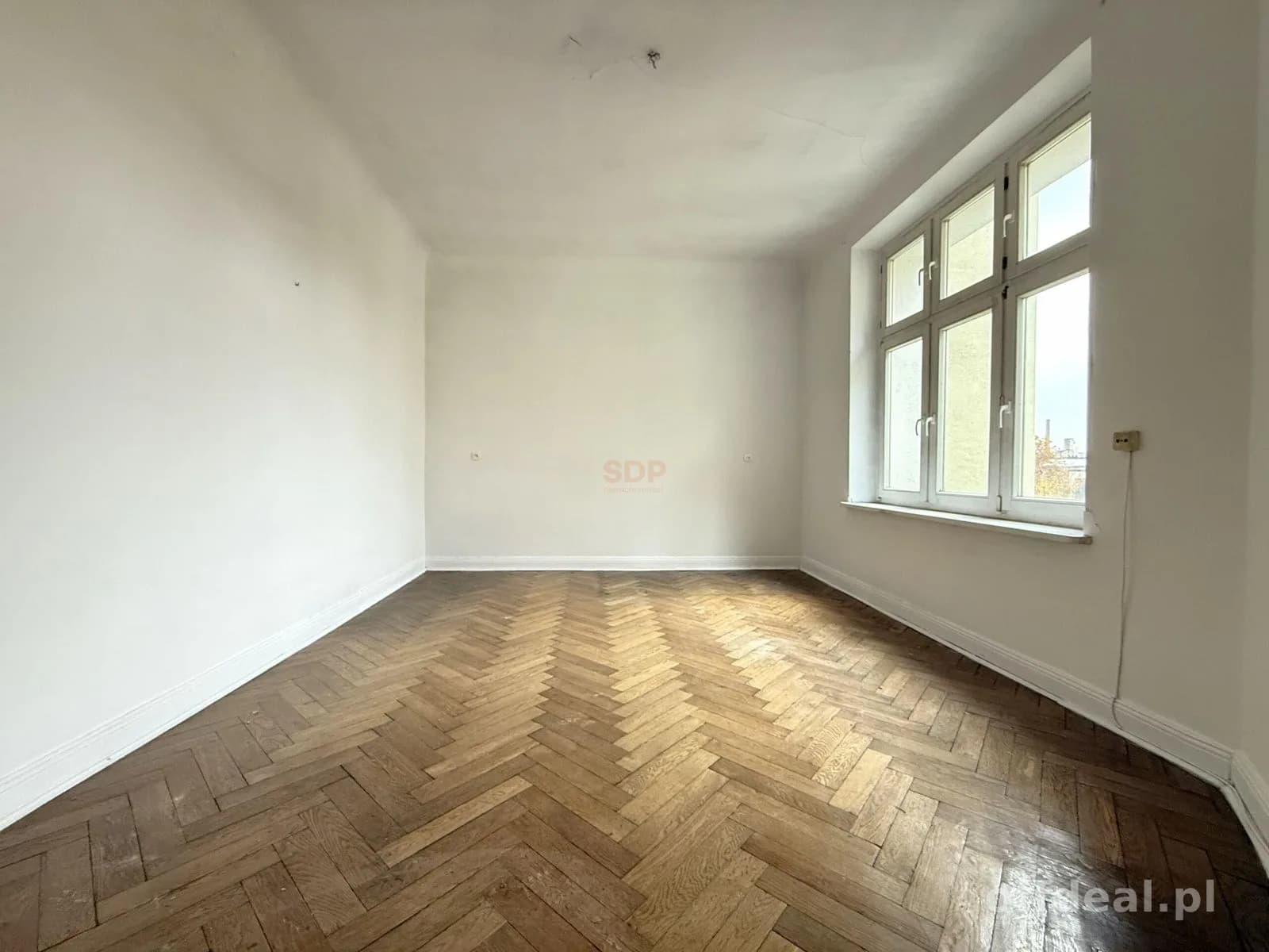 Jasne mieszkanie do własnej aranżacji przy Manufakturze!