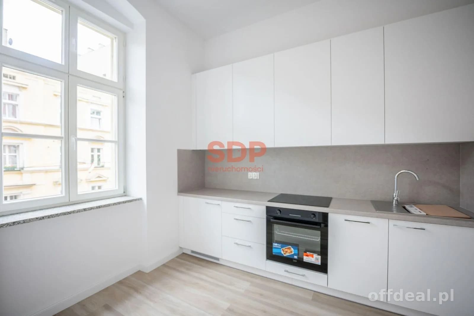kawalerka z osobną kuchnią | piekna kamienica | balkon