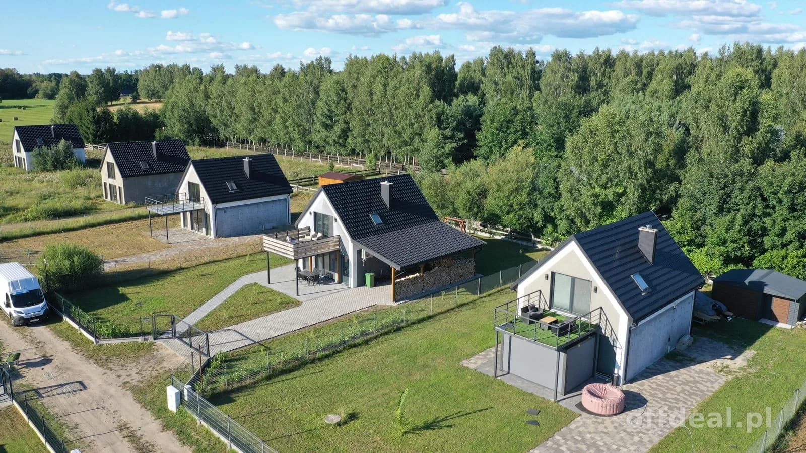 Domy nad jeziorem - początek Szlaku Wielkich Jezior Mazurskich