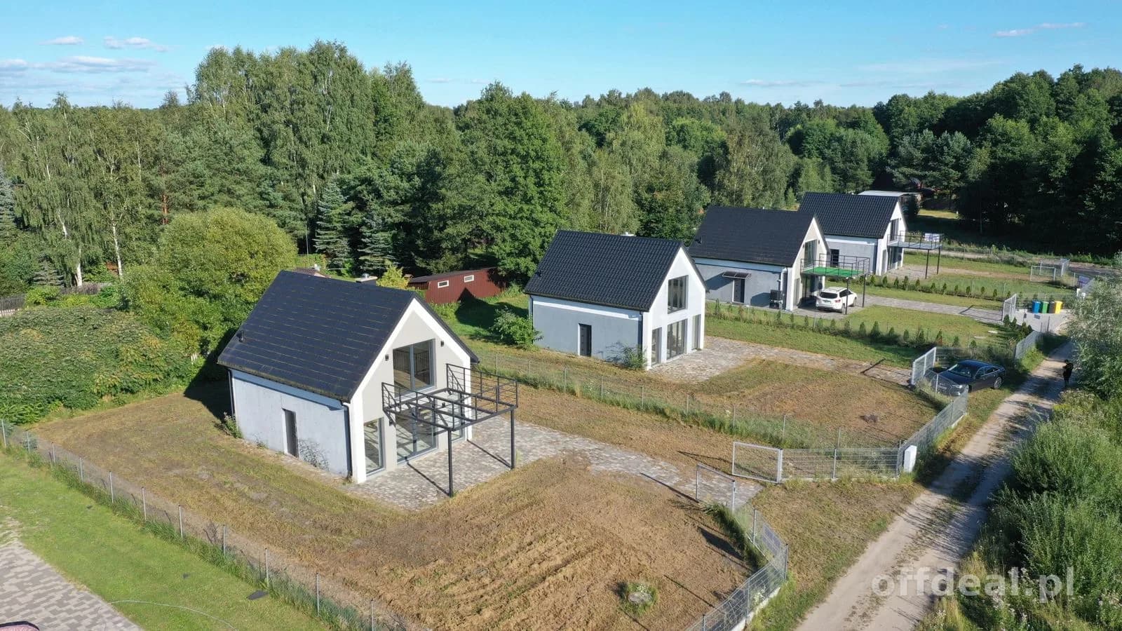 Domy nad jeziorem - początek Szlaku Wielkich Jezior Mazurskich