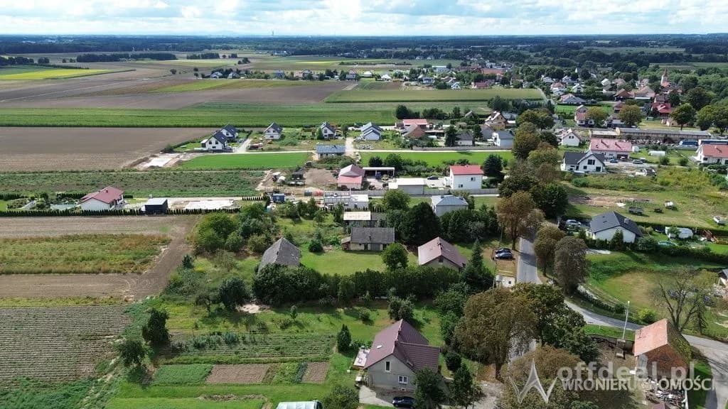 Działki 1,3550 HA oraz dom i budynki gospodarcze