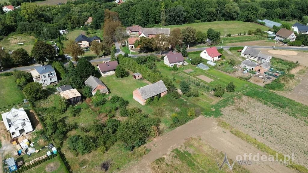 Działki 1,3550 HA oraz dom i budynki gospodarcze