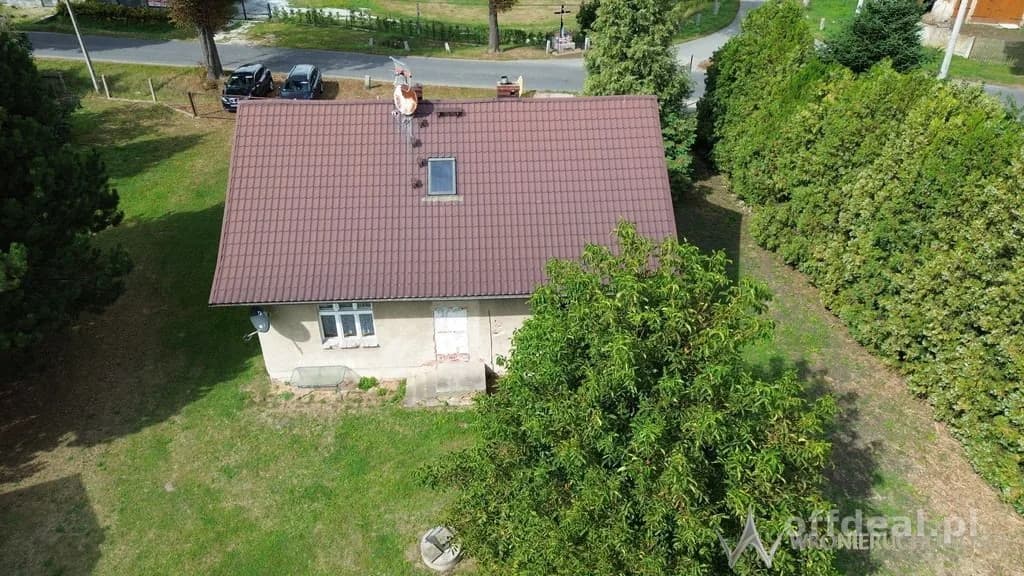 Działki 1,3550 HA oraz dom i budynki gospodarcze