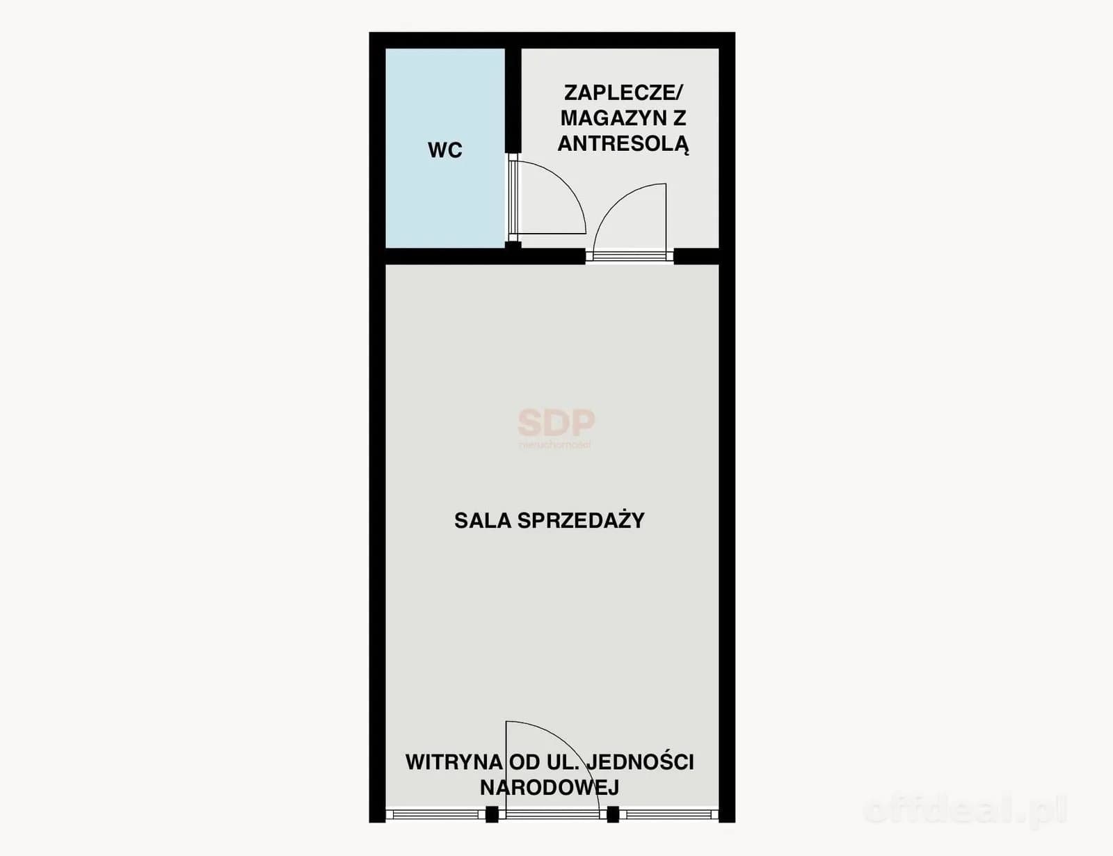 Lokal z witrynami przy ruchliwej ulicy.