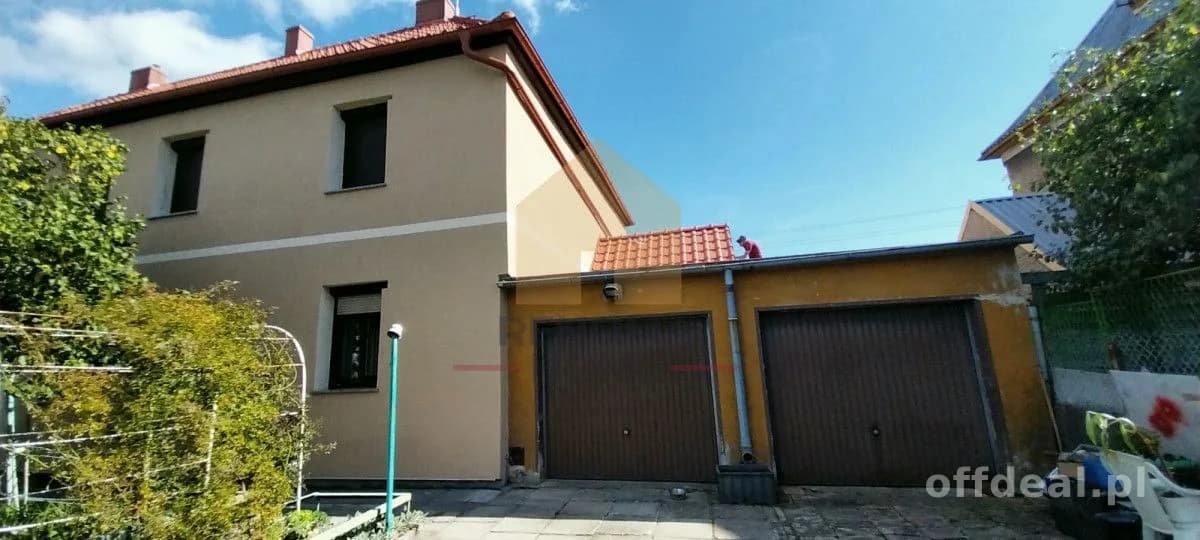 Mieszkanie z ogródkiem i dwoma garażami!